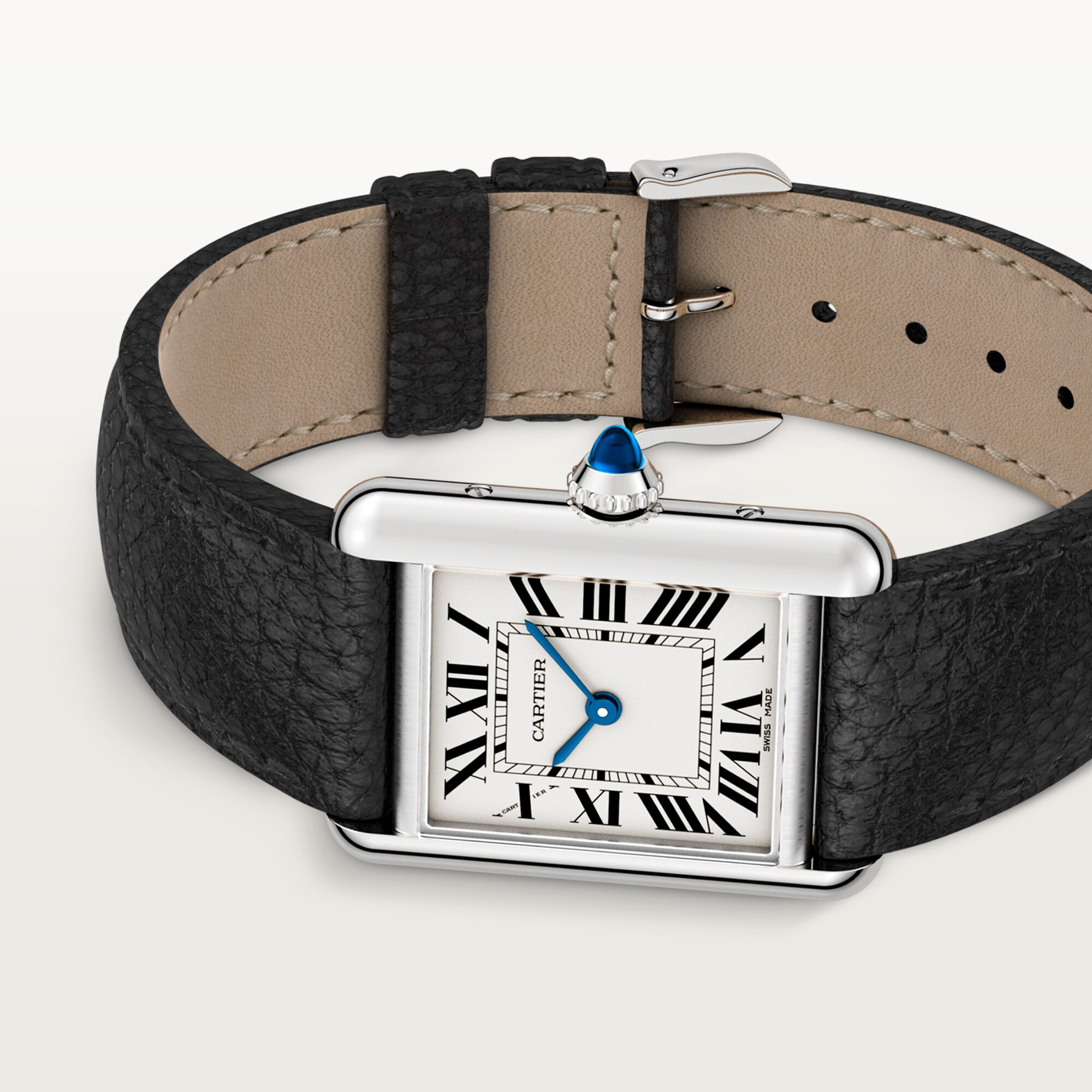 Angled close-up of a small Tank Must dupe Cartier watch: steel case, white Roman dial, blue hands, and textured black leather strap.
