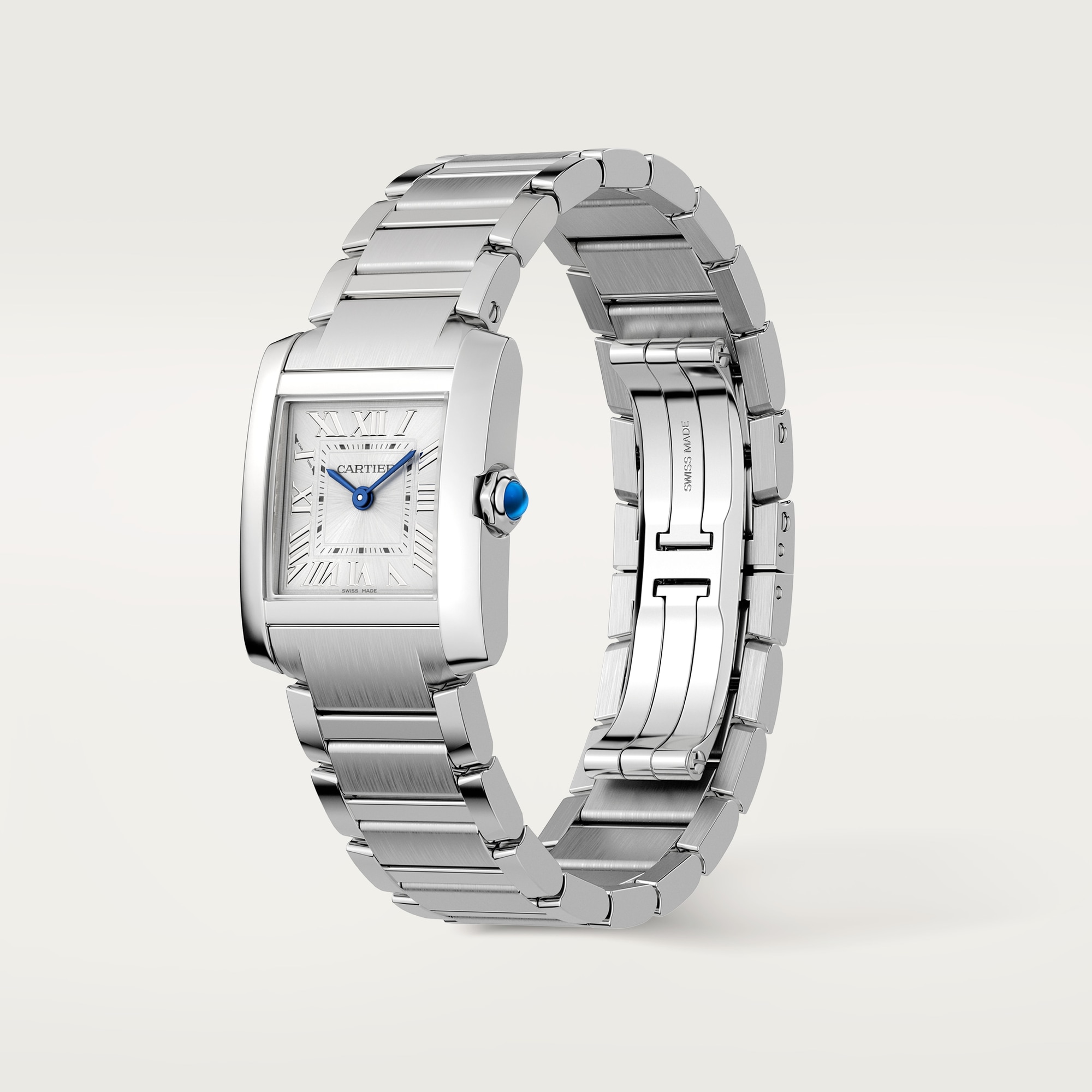 Angled view of a small Tank Française dupe Cartier watch with a full steel case, silver Roman dial, and integrated steel bracelet.