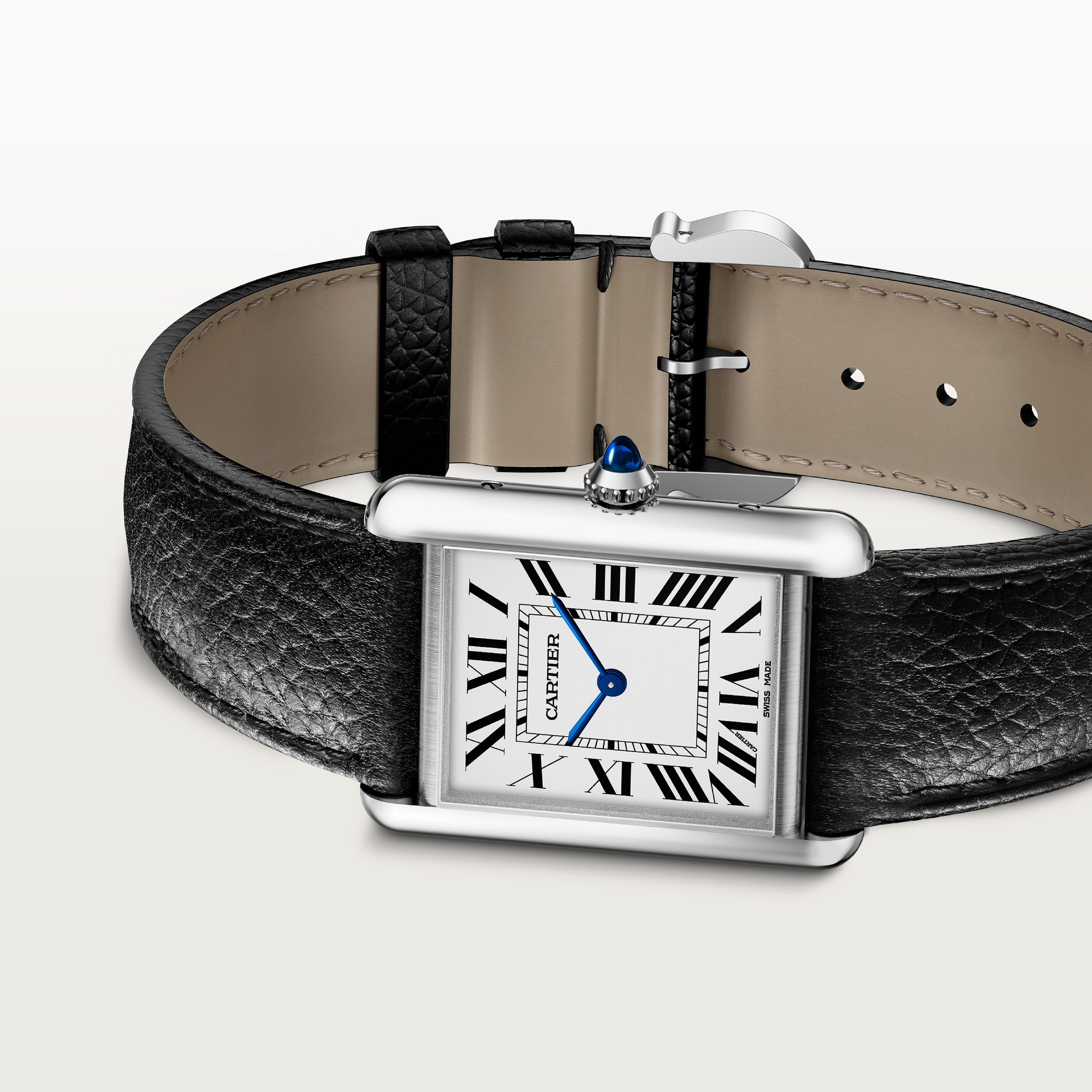 Angled view of a large Tank Must Solarbeat™ dupe Cartier watch: steel case, white Roman dial, blue hands, and black leather strap.