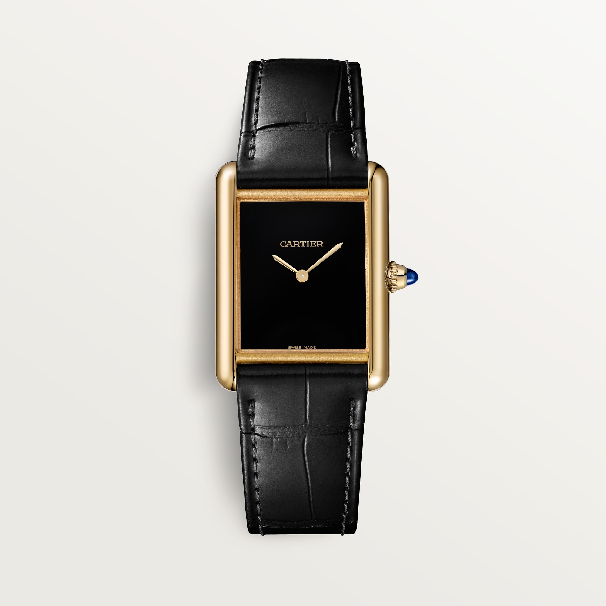 Front view of a Dupe Tank Louis Cartier large model watch with a yellow gold color case, black dial, and black leather strap.