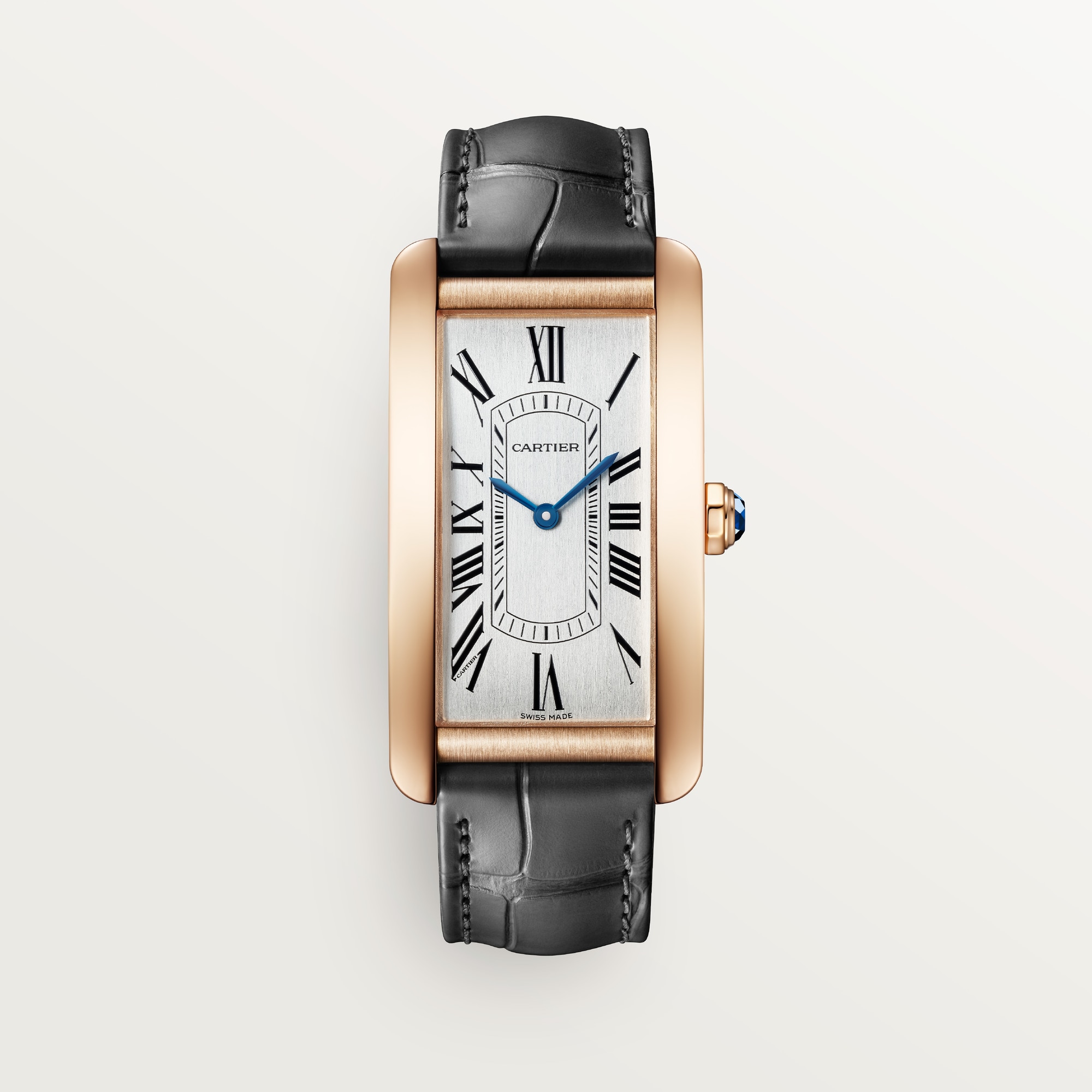 Front view of a Dupe Tank Américaine large model watch with a rose gold colors curved case, silver-white dial, and black leather strap.