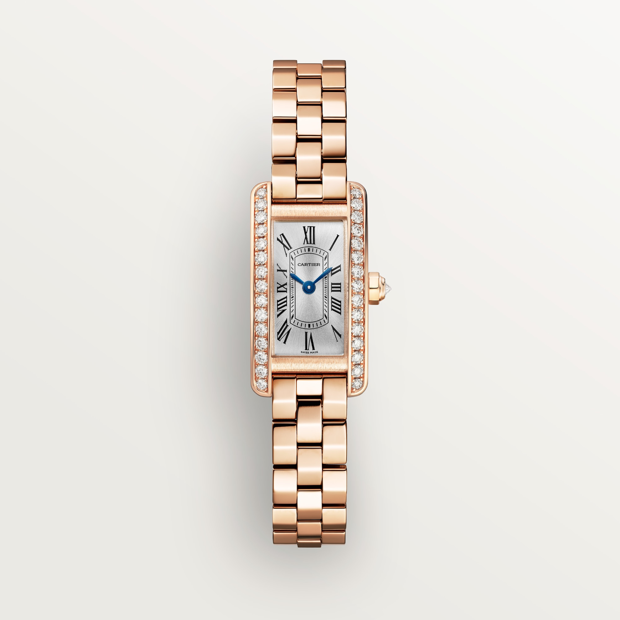 Front view: Dupe Tank Américaine mini model watch, rose gold color curved case set with diamonds, and matching rose gold color bracelet.