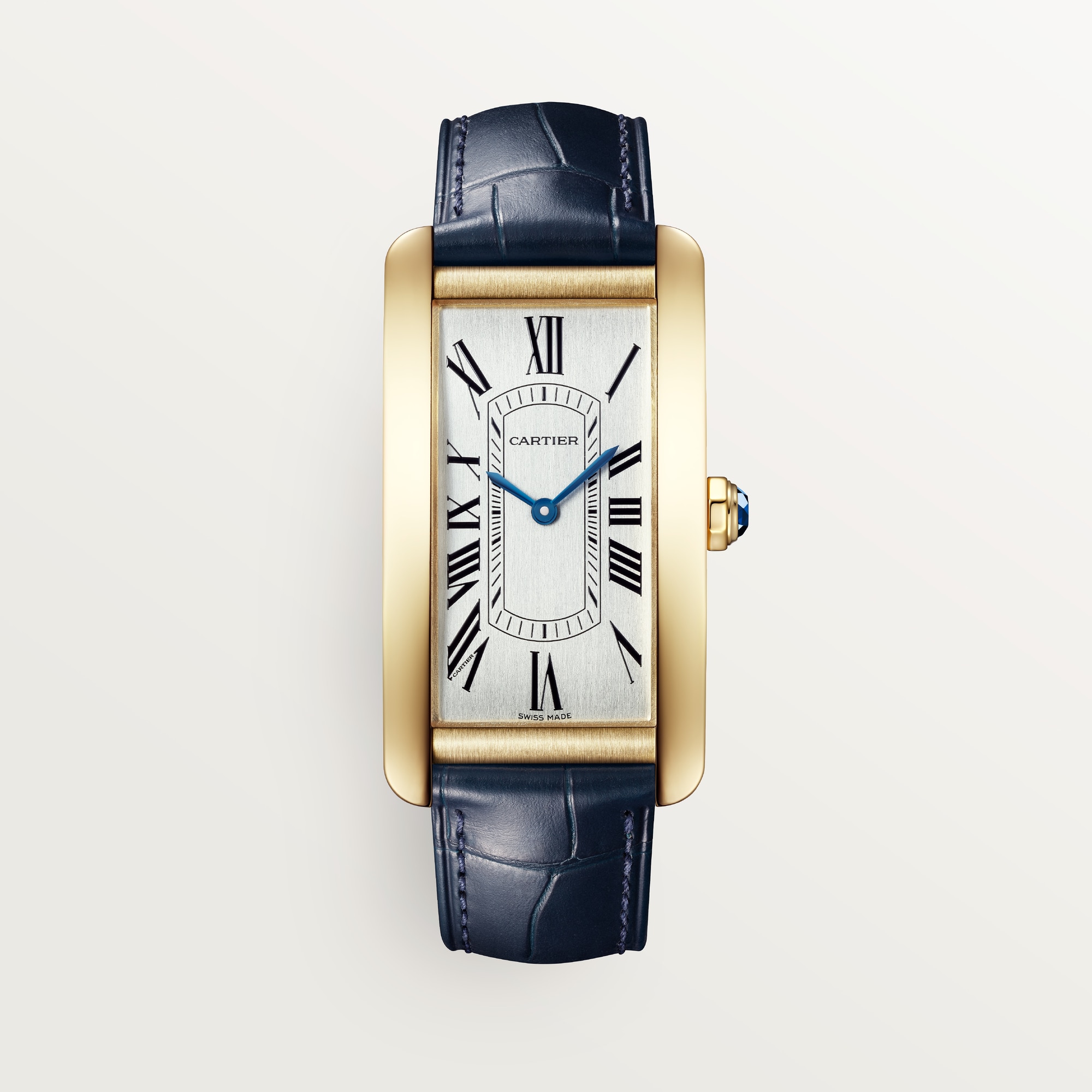 Front view of a Dupe Tank Américaine large model watch featuring a yellow gold colors curved case, silver-white dial, and blue leather strap.