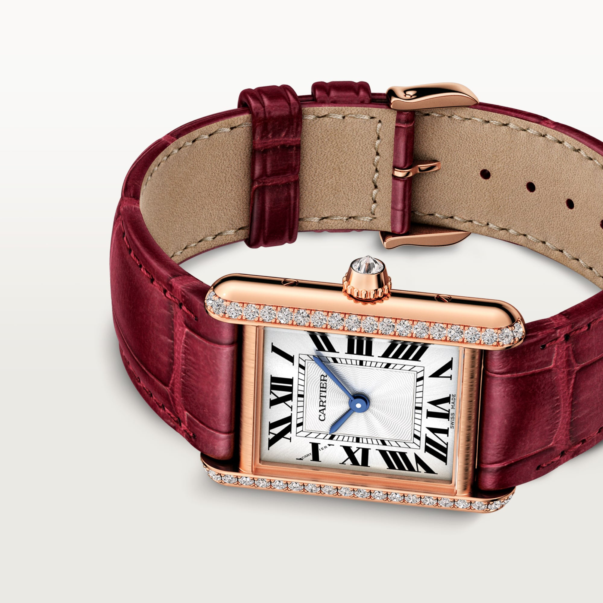 Angled view: Dupe Tank Louis Cartier small model watch with rose gold diamond-set case and burgundy alligator-patterned leather strap.