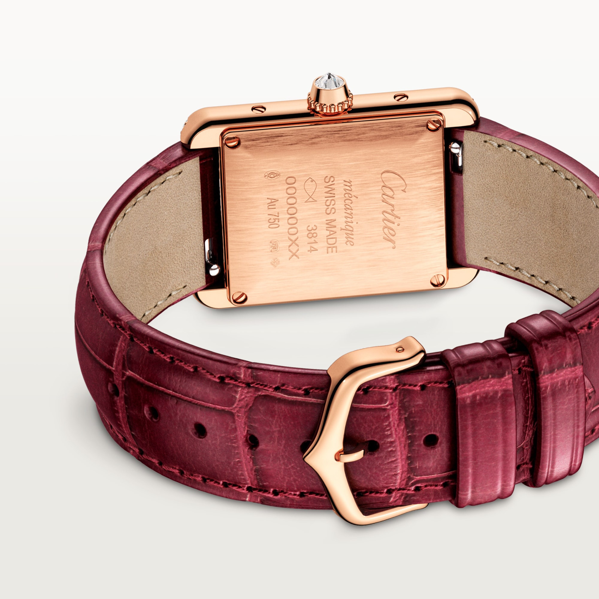 Caseback & clasp: Dupe Tank Louis Cartier small model watch, rose gold case, burgundy leather strap with rose gold buckle detail.