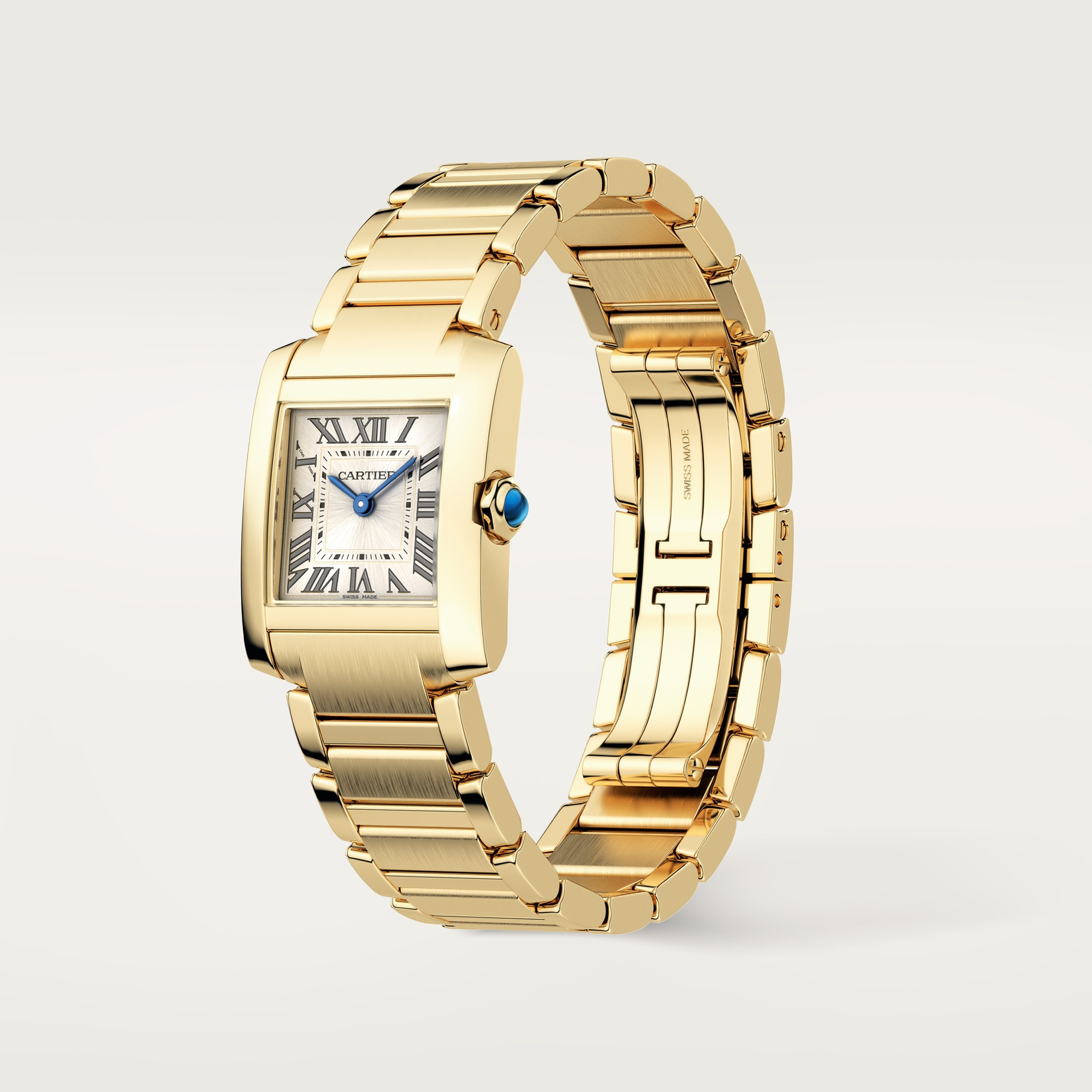 Angled view: Dupe Tank Française small model watch, yellow gold colors case and metal bracelet, showing the folding clasp.