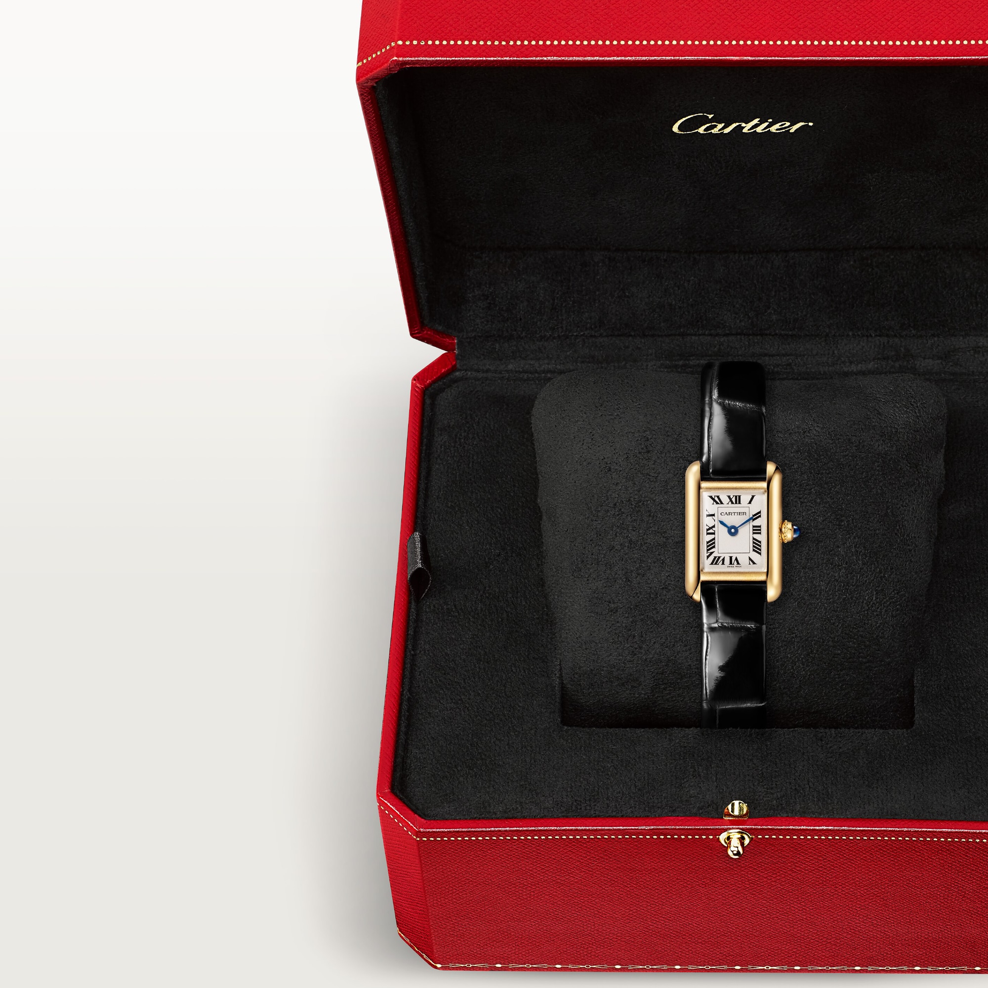 In box: Dupe Tank Louis Cartier mini model watch in yellow gold colors with black patent leather strap, presented in its iconic red brand packaging.