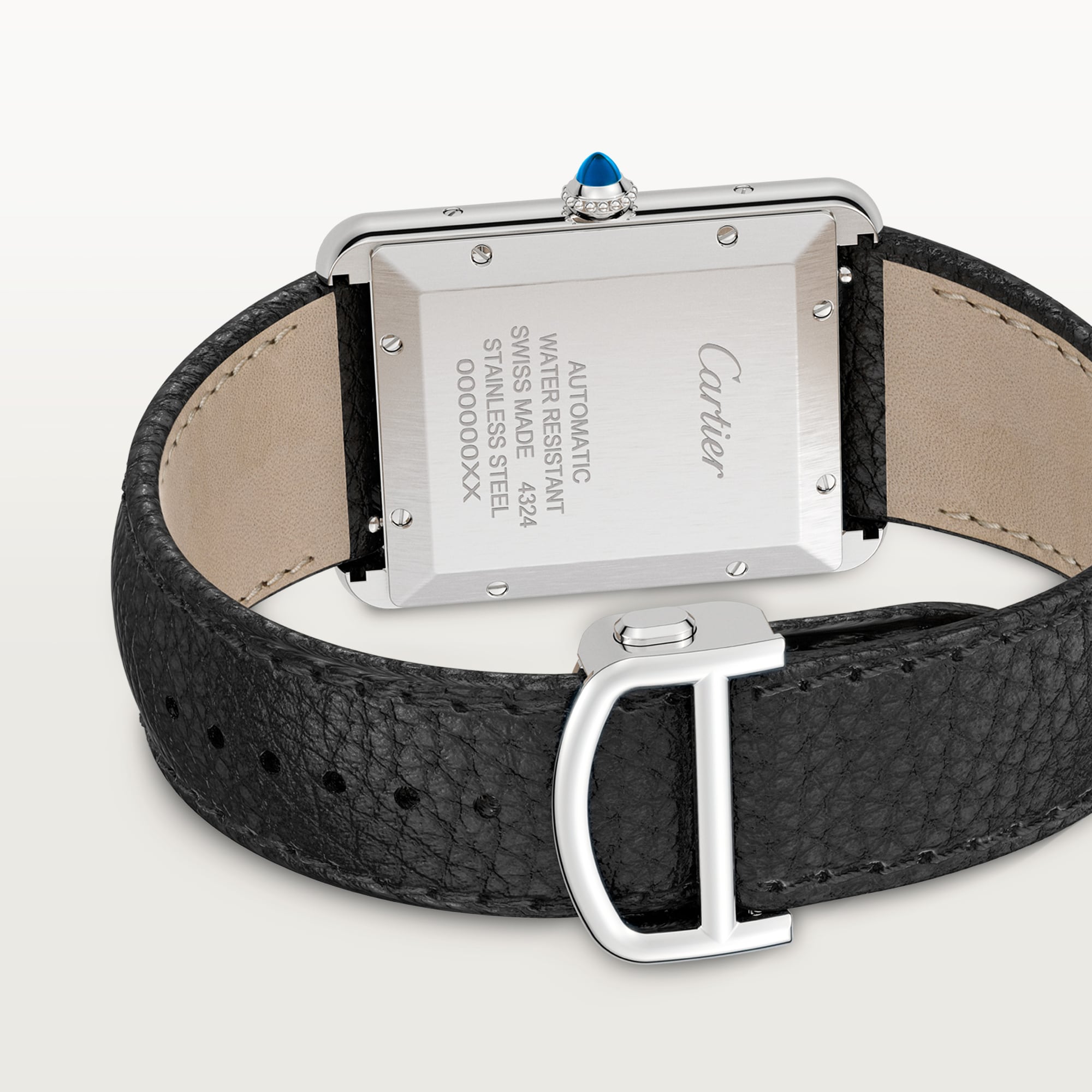 Caseback & clasp: Dupe Tank Must extra-large model watch, steel case, showing engravings, black leather strap, and steel buckle.