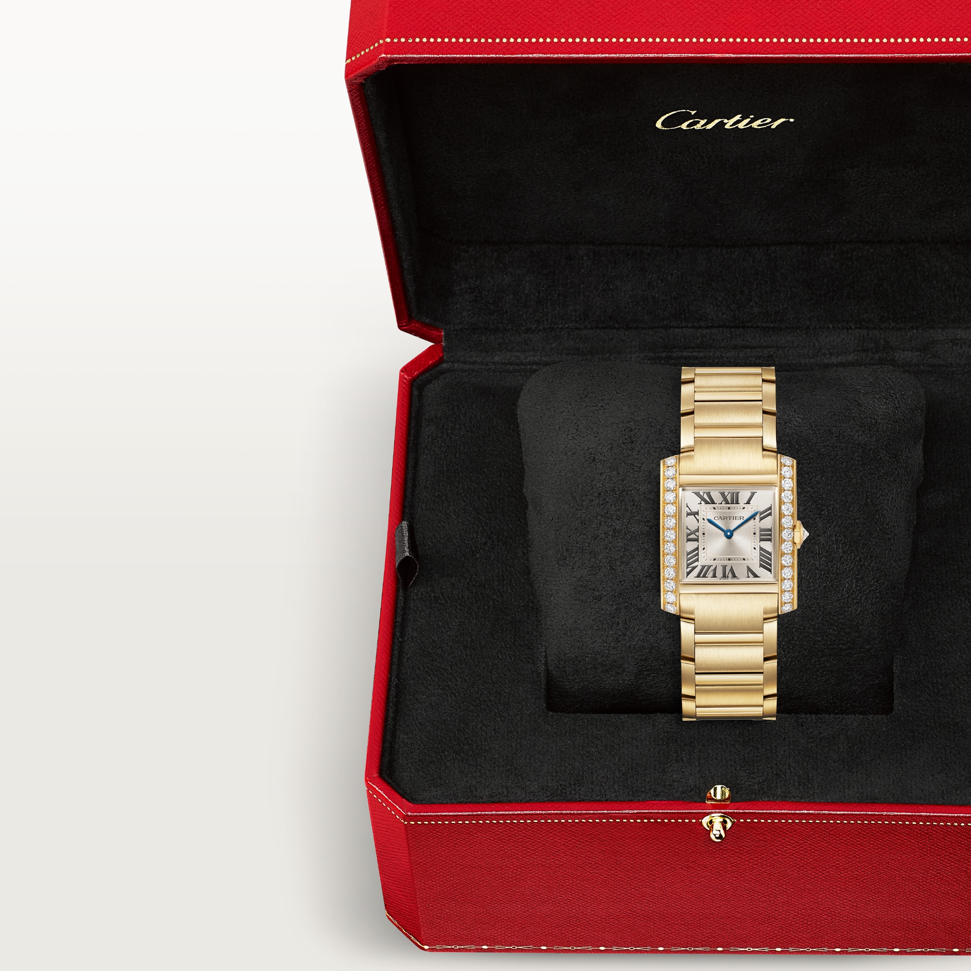 In box: Dupe Tank Française medium model yellow gold diamond watch with gold bracelet, presented in its iconic red brand packaging