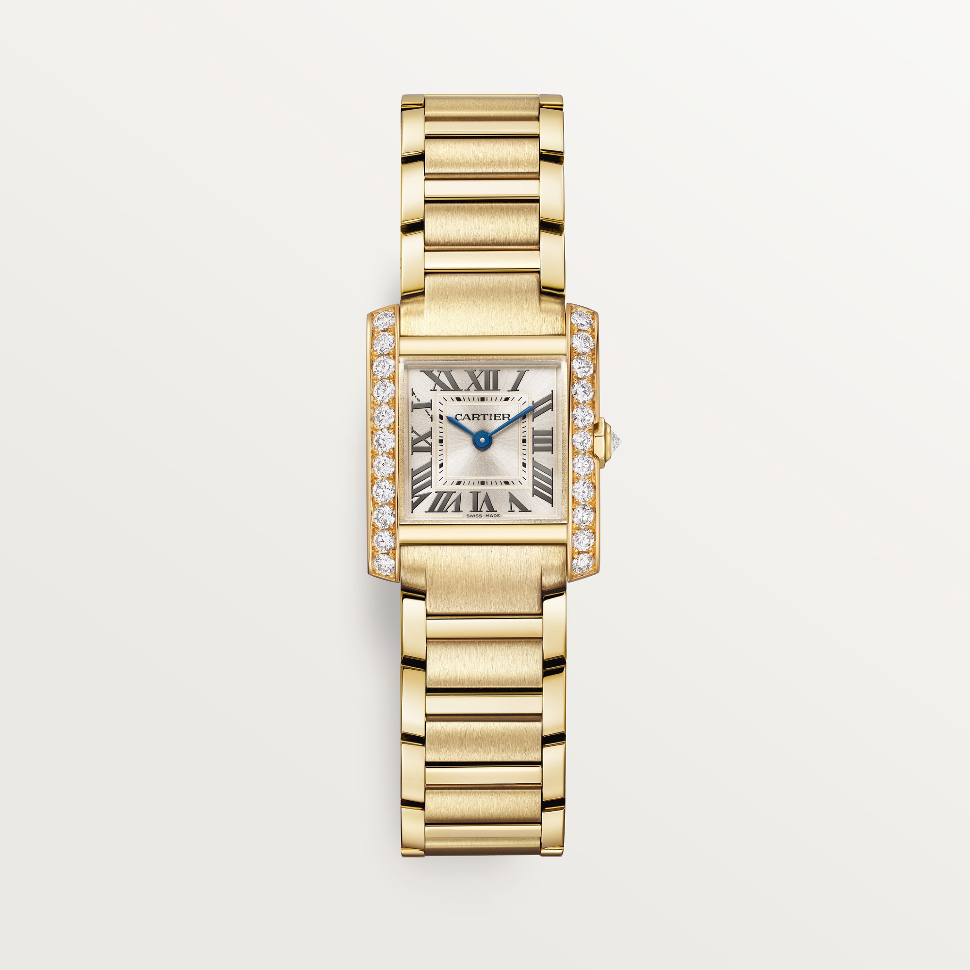 Front view: Dupe Tank Française small model watch, yellow gold color case set with diamonds, white dial, and matching metal bracelet.