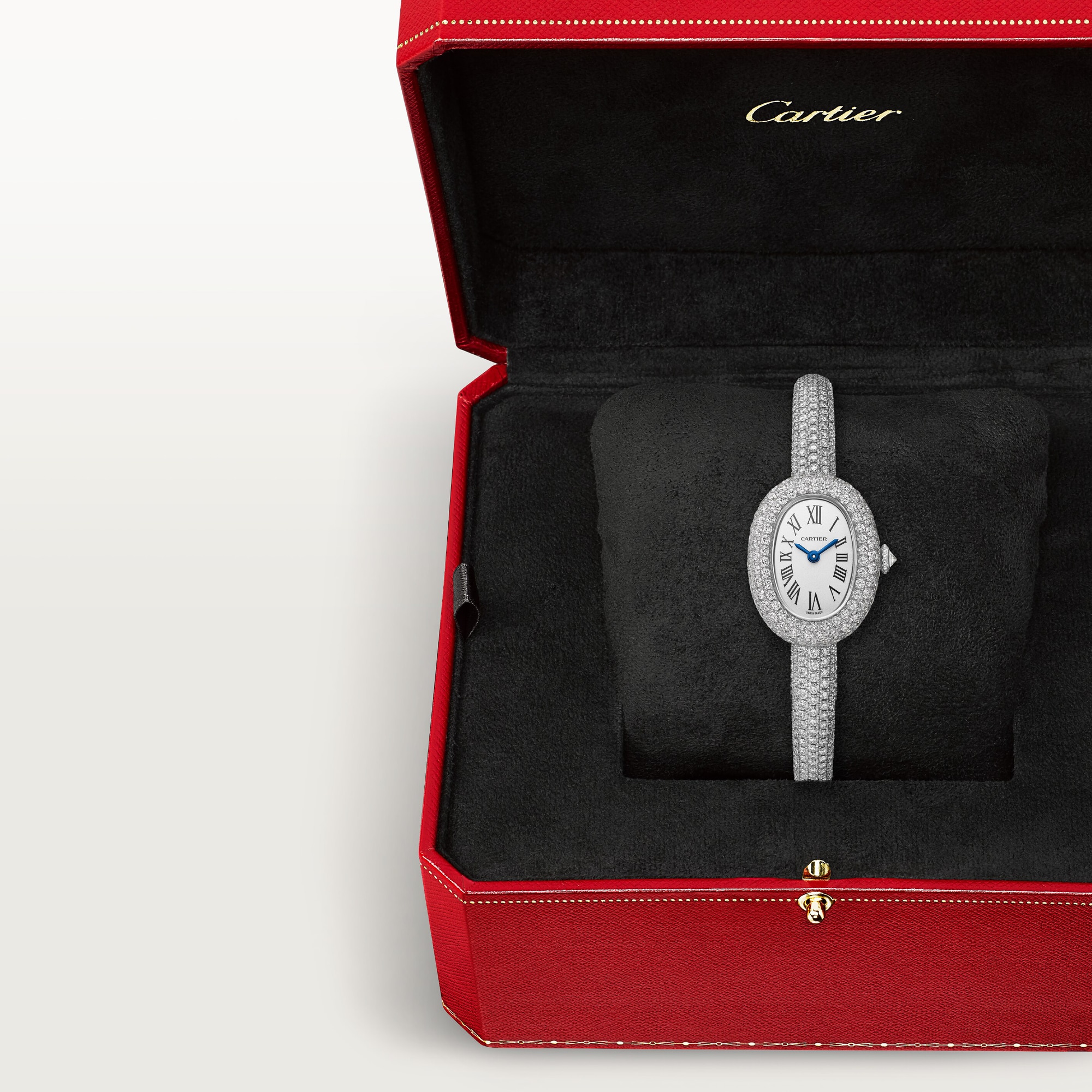Cartier Baignoire mini diamond white gold watch elegantly displayed in a red Cartier branded case.