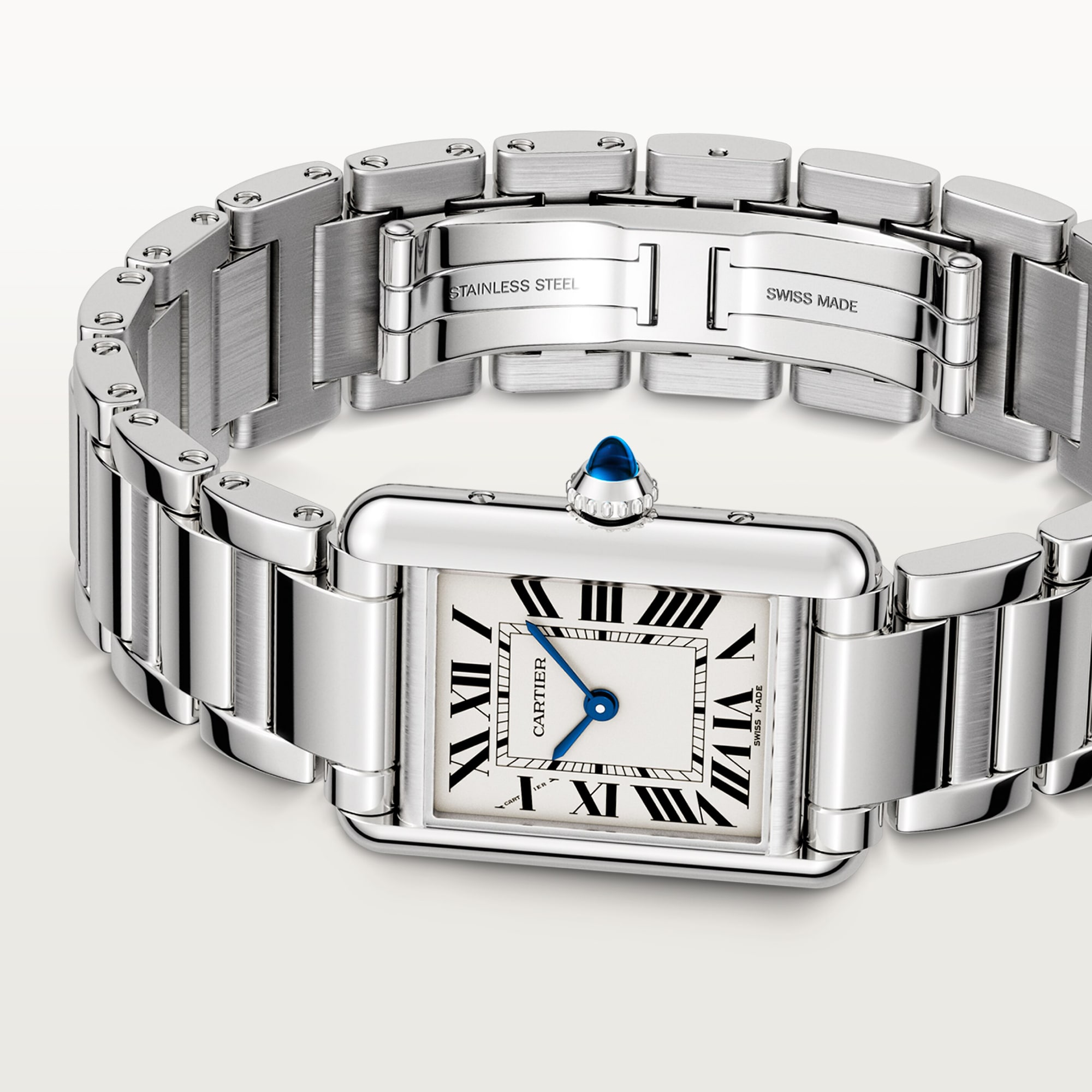 Detailed view of the steel bracelet and clasp of a small Tank Must dupe Cartier watch.