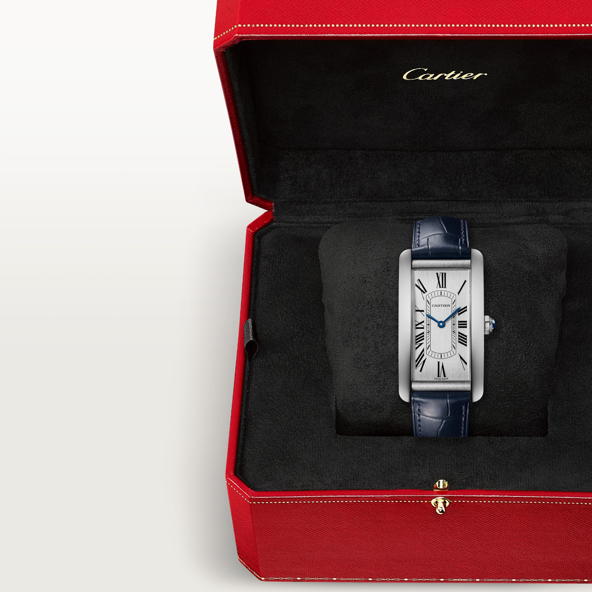 In box: Dupe Tank Américaine large model watch with steel case and blue leather strap, presented in its iconic red brand packaging.