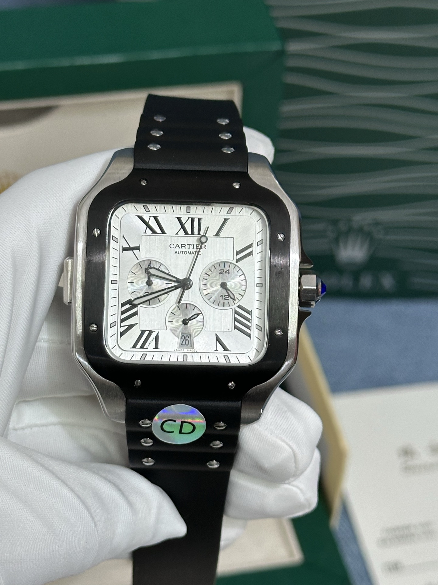 The Cartier Santos Chronograph XL is a masterclass in sporty elegance. With its bold black bezel and rubber strap, it's a modern icon. Want to make this coveted style your own? Our 2025 guide to affordable luxury shows you how. Link in bio for more!