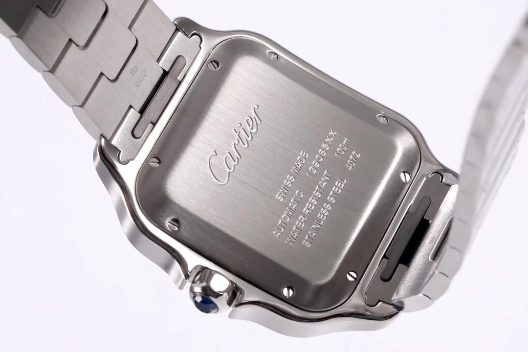 Detailed close-up of the caseback of the BVF Super Clone Cartier Santos silver case replica watch, showcasing its steel construction and engravings.