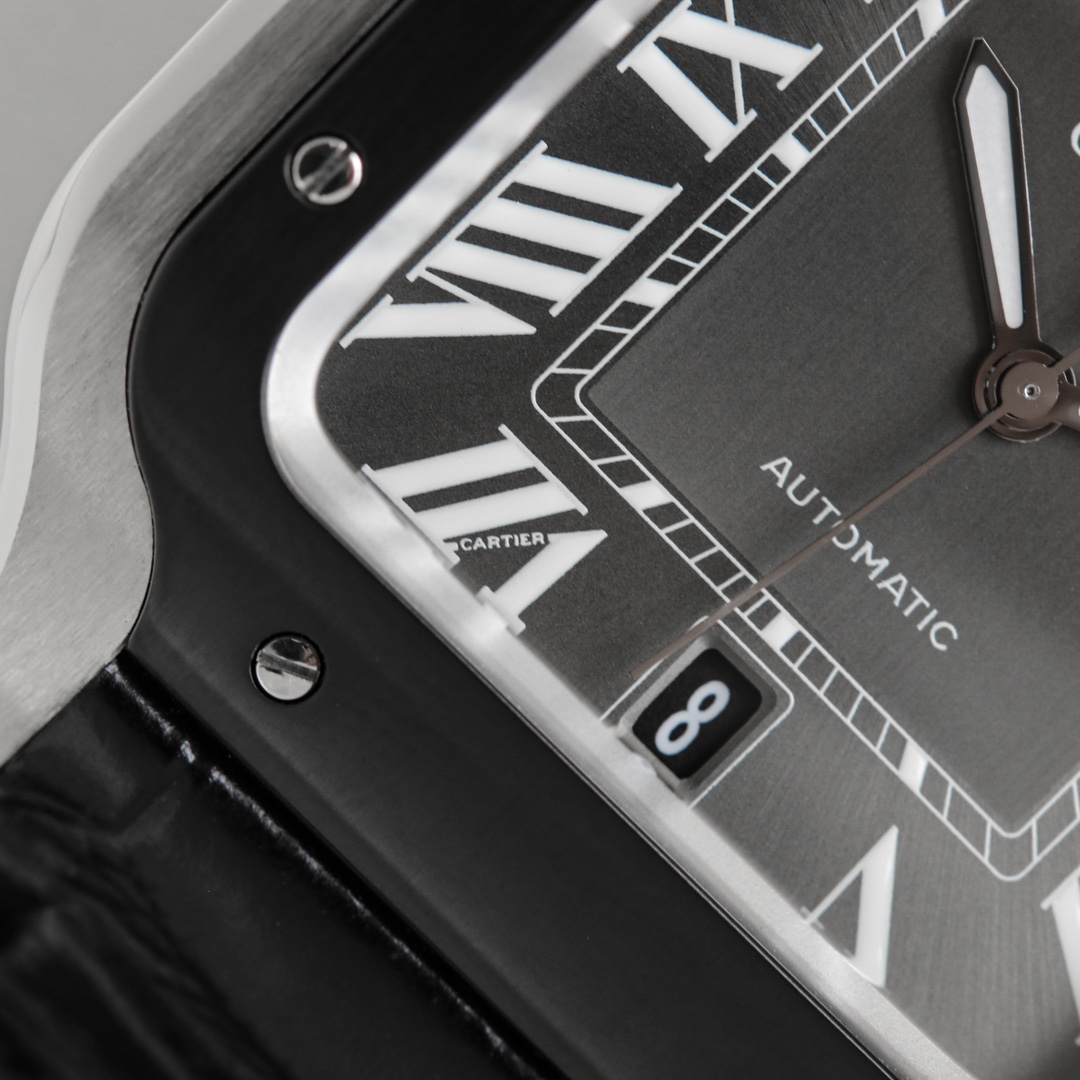 Close-up of the dial of the BVF Super Clone Cartier Santos Black & Steel case replica watch, clearly showing the date window and Roman numerals.