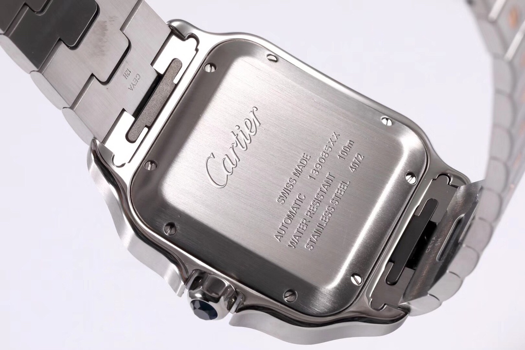 Detailed close-up of the caseback of the BVF Super Clone Cartier Santos rose gold and steel two-tone replica watch, showcasing its steel construction and engravings.