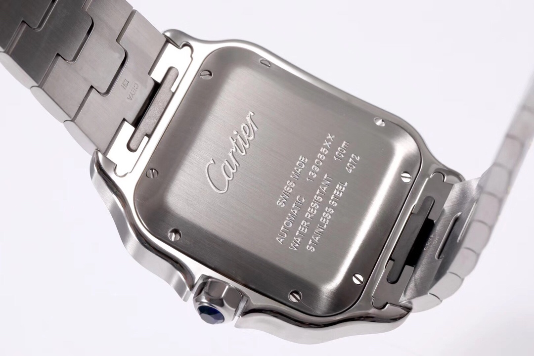 Detailed close-up of the caseback of the BVF Super Clone Cartier Santos two-tone case replica watch, showcasing its steel construction and engravings.