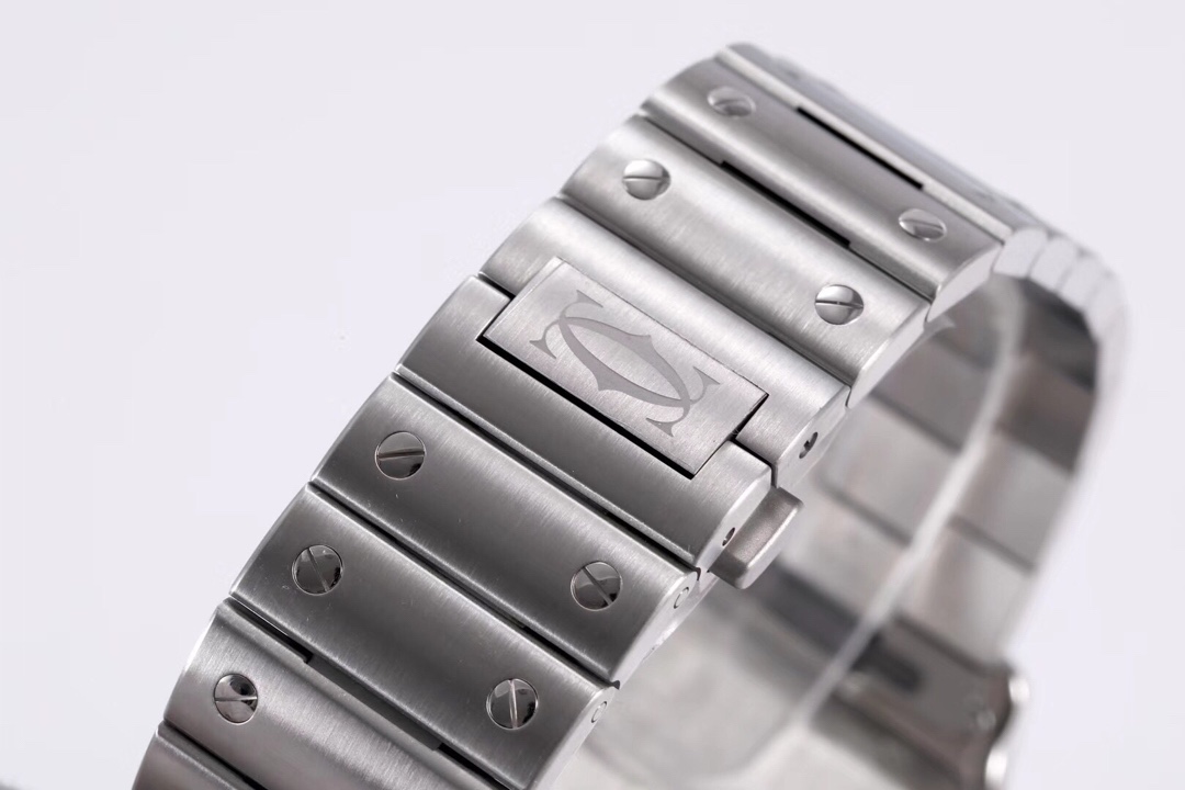 Close-up of the clasp on the BVF Super Clone Cartier Santos silver case replica watch's steel bracelet, featuring the Cartier logo.