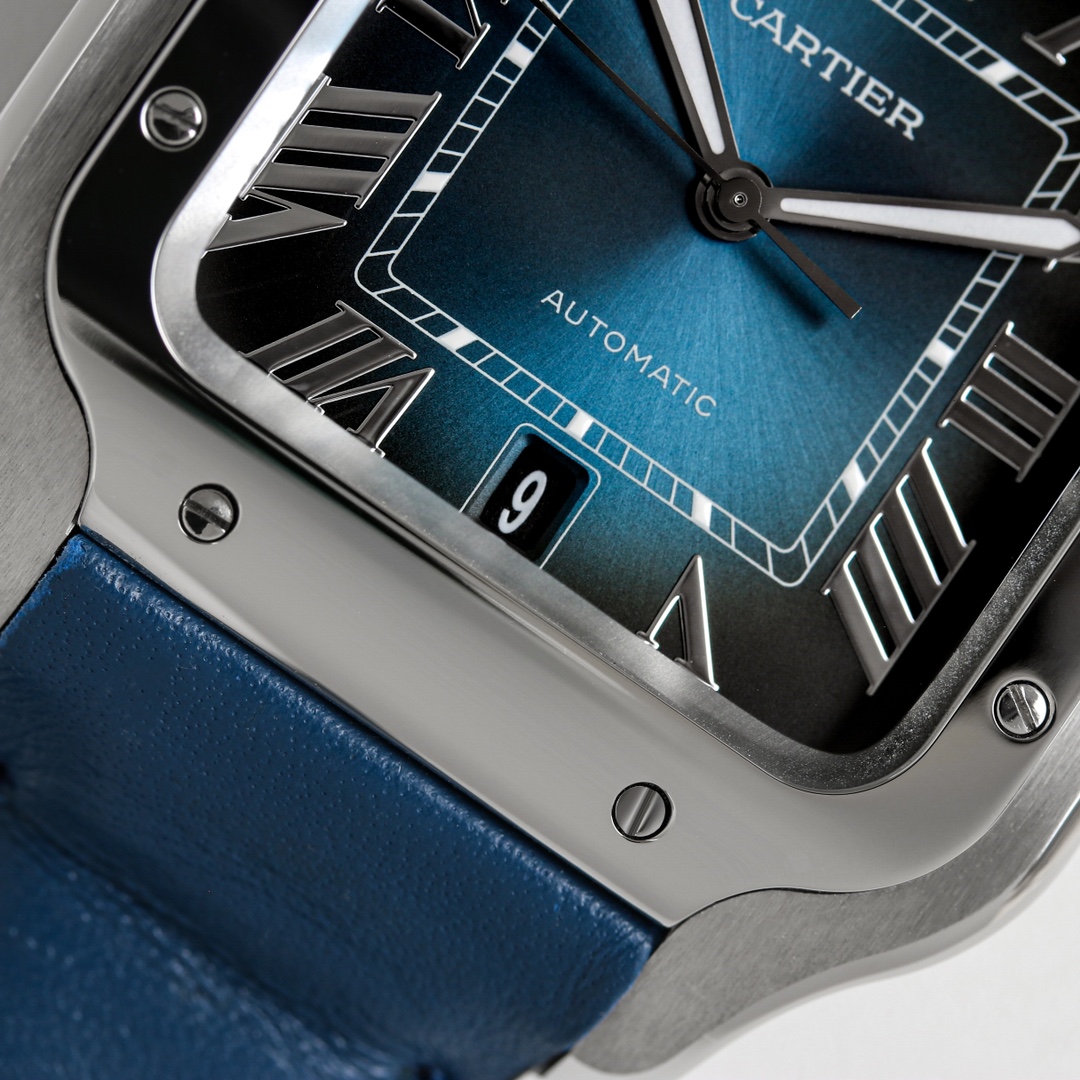 Close-up of the blue dial of the BVF Super Clone Cartier Santos silver case replica watch, clearly showing the date window and Roman numerals.