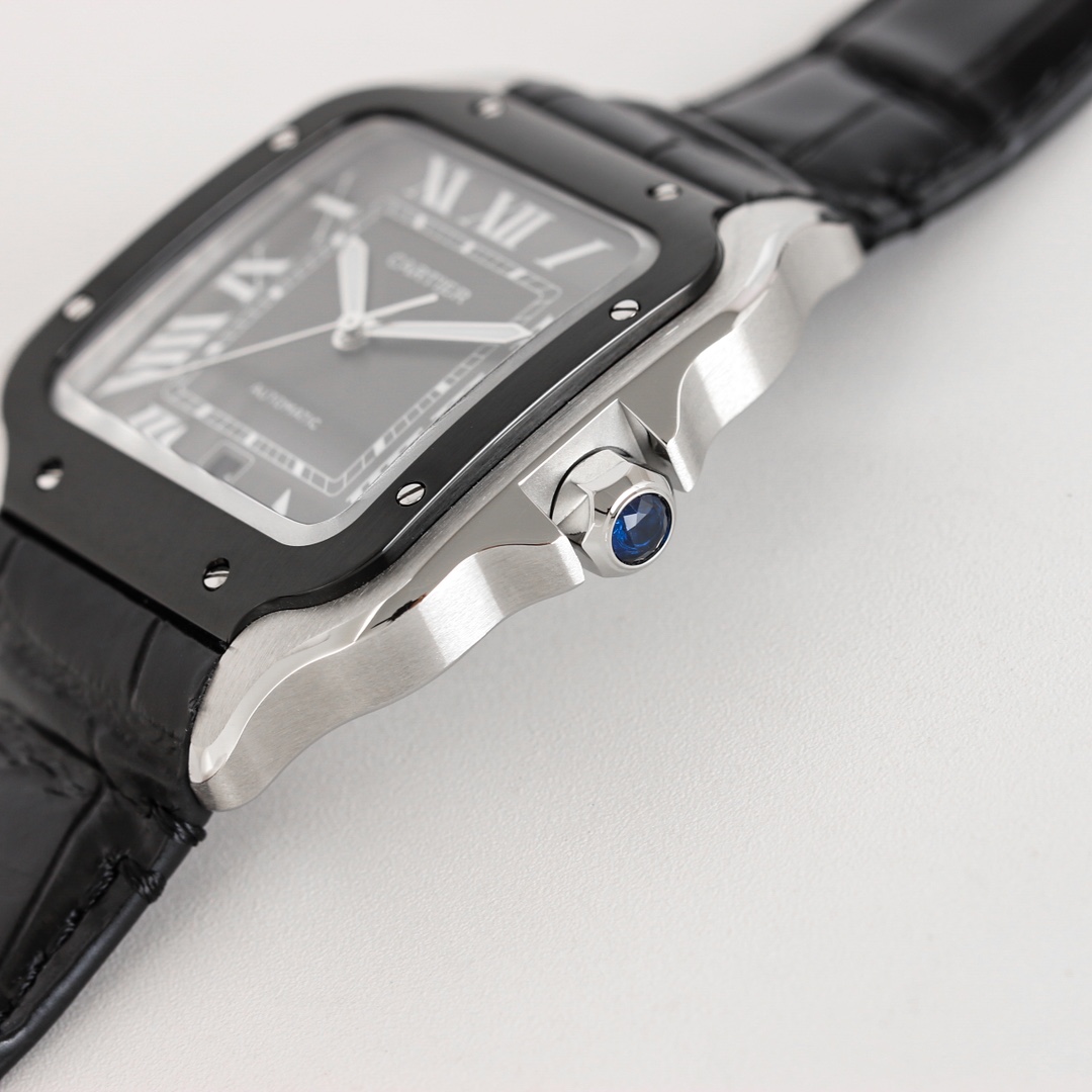 Close-up of the crown of the BVF Super Clone Cartier Santos Black & Steel case replica watch, featuring the iconic blue gemstone.