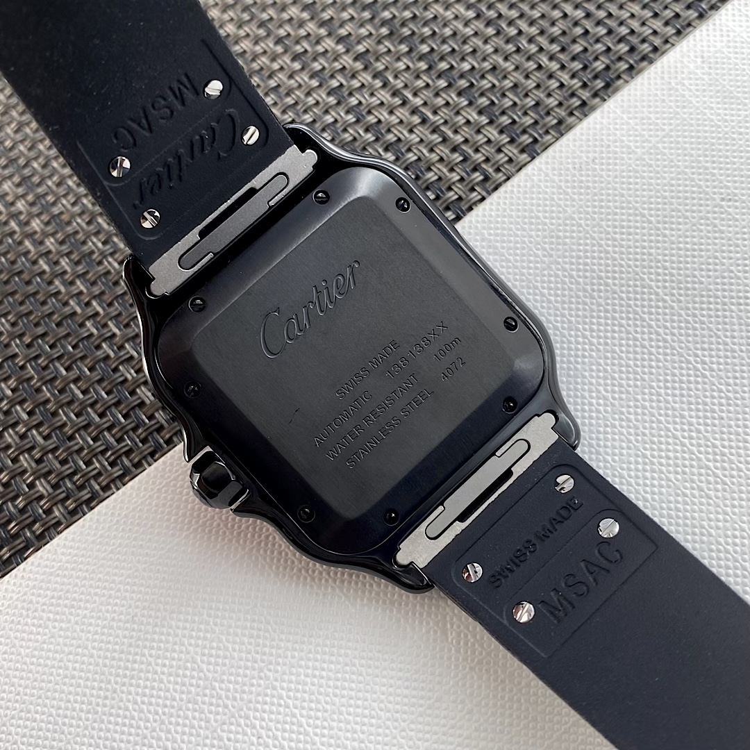 Close-up of the case back of the BVF Super Clone Cartier Santos WSSA0039 black case replica watch, with visible engravings including 