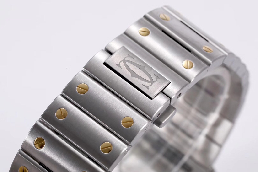 Close-up of the clasp on the BVF Super Clone Cartier Santos two-tone case replica watch's steel bracelet, featuring the Cartier logo.