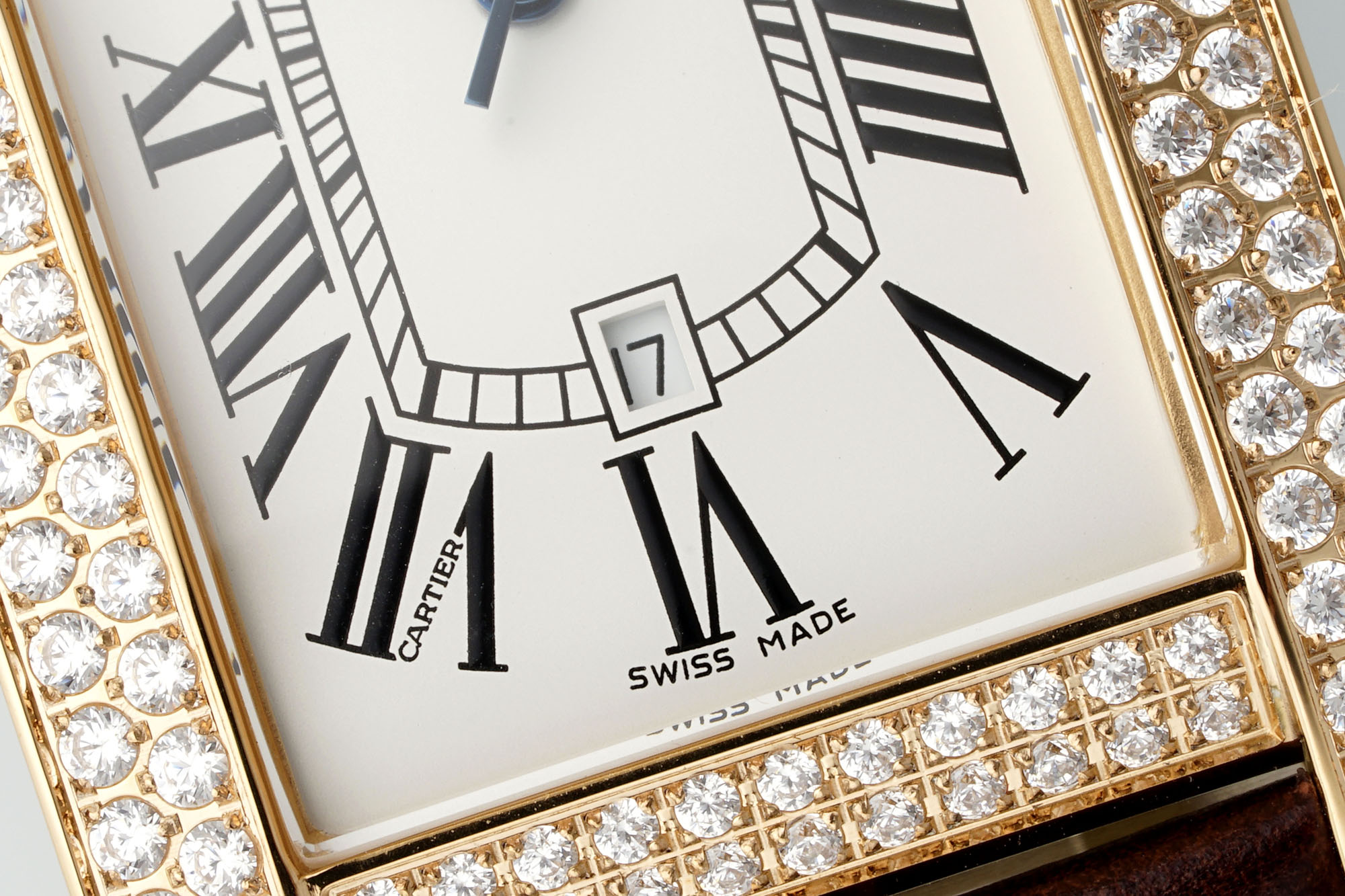 Close-up of the dial of the AF Super Clone Cartier Tank Américaine rose gold diamond-set replica watch, showing the date window and 