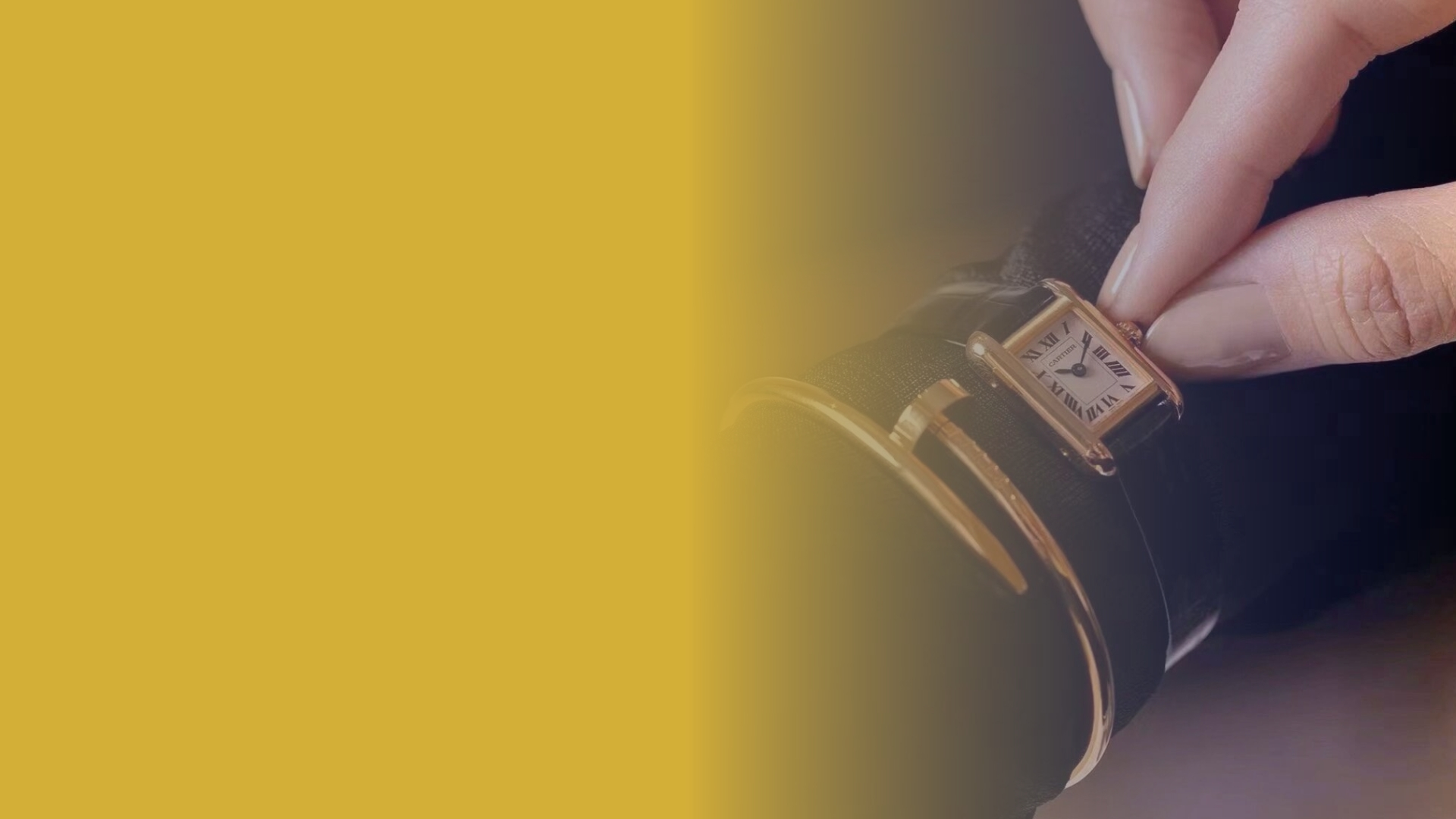 Elegant Cartier Tank watch dupe with gold trim and dark band being adjusted Affordable luxury watch dupe